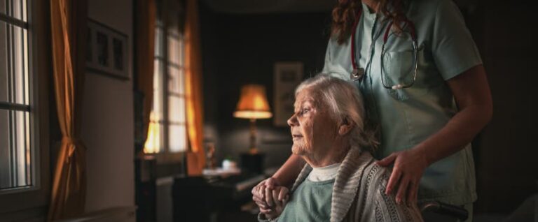 Nurse visiting resident with disabilities
